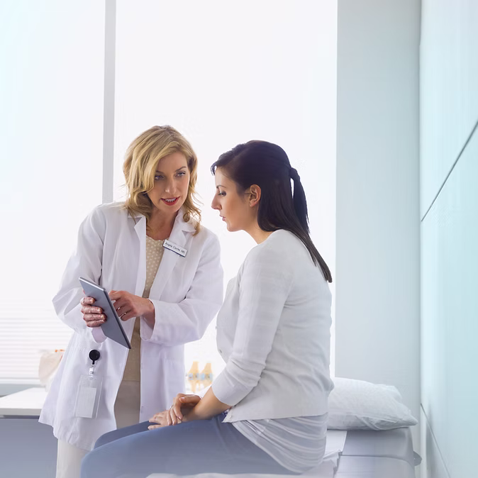 Care professional speaking with a patient